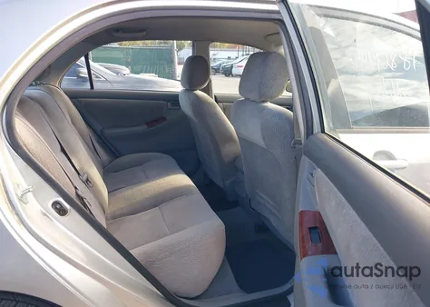 2003 Toyota Corolla Le from USA, damaged, VIN JTDBR32E732012437